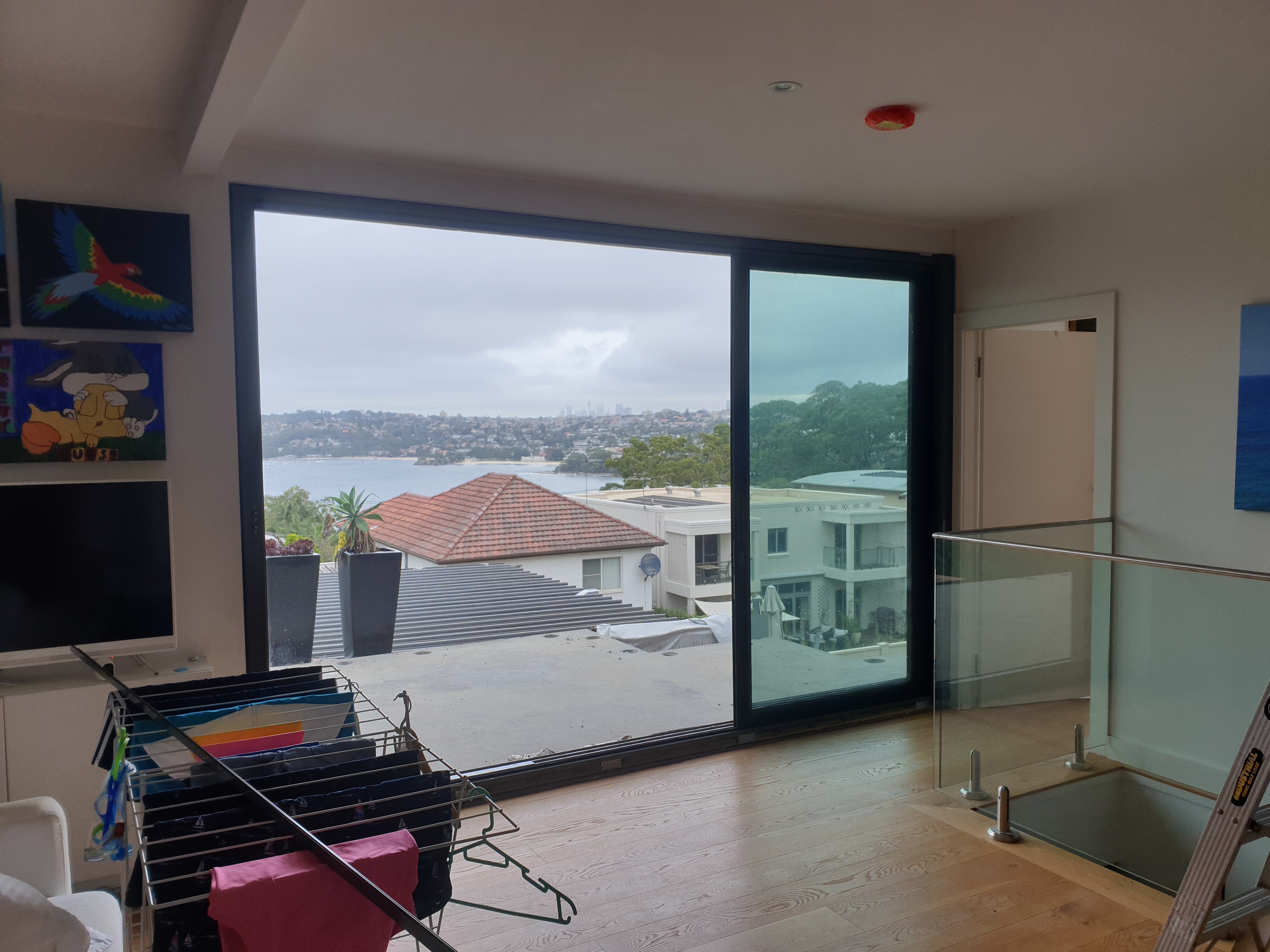Architectural bifold doors functioning perfectly with custom screen integration