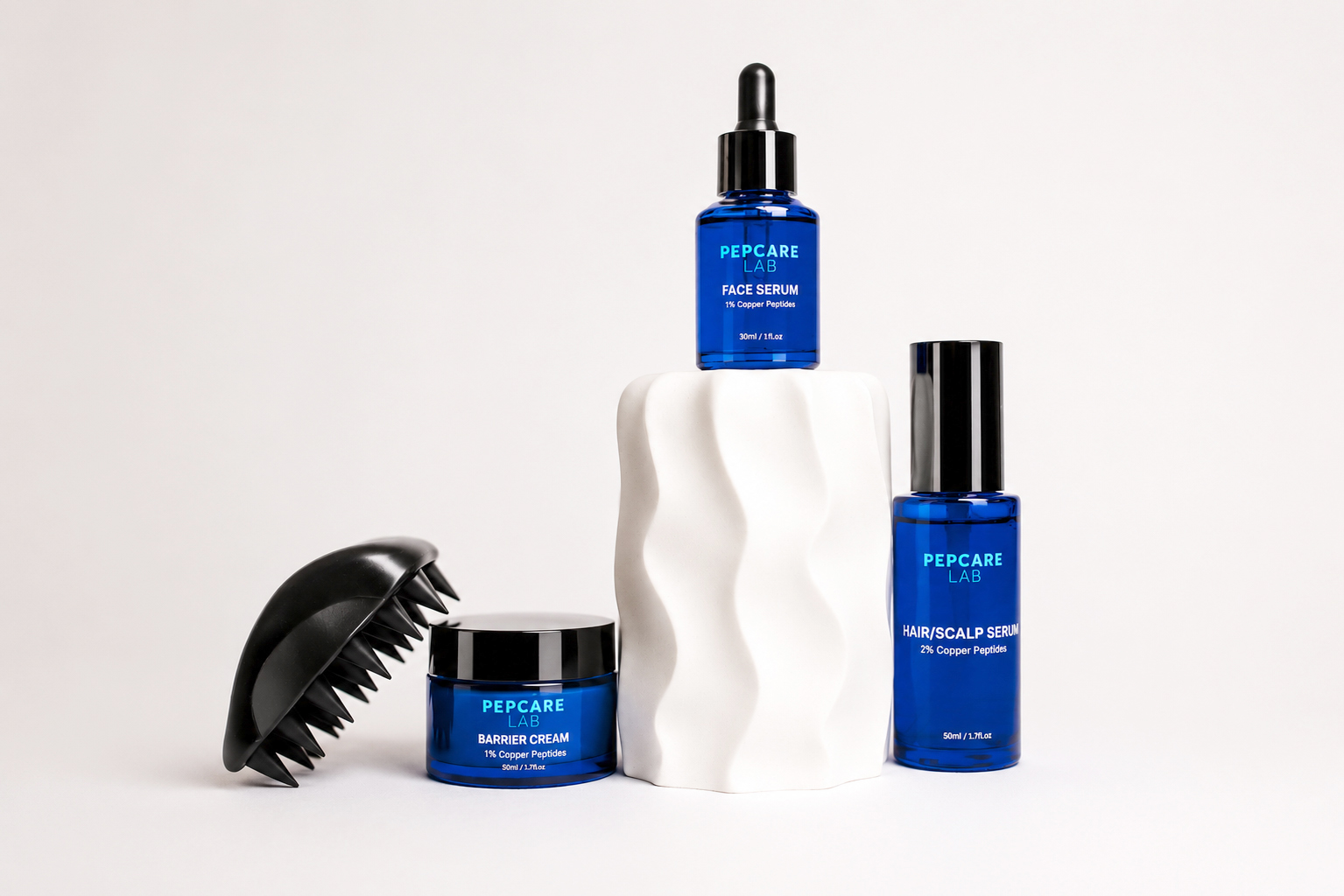 Woman with glowing skin applying Pepcare Lab serum